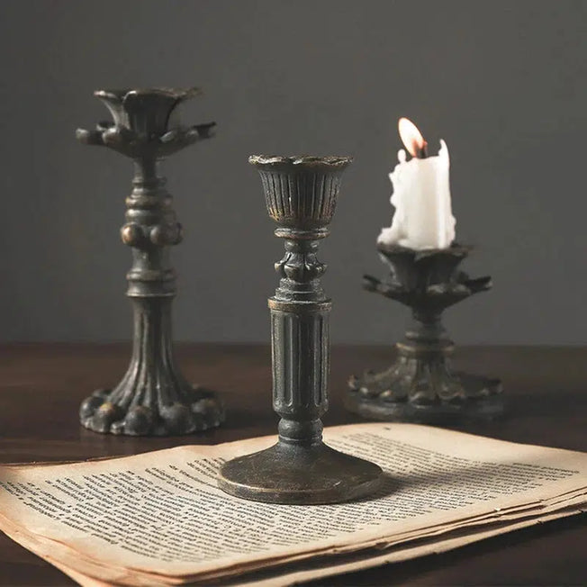 Vintage Candle Holder: Add a touch of classic elegance to your wedding decor with this timeless candelabra stand