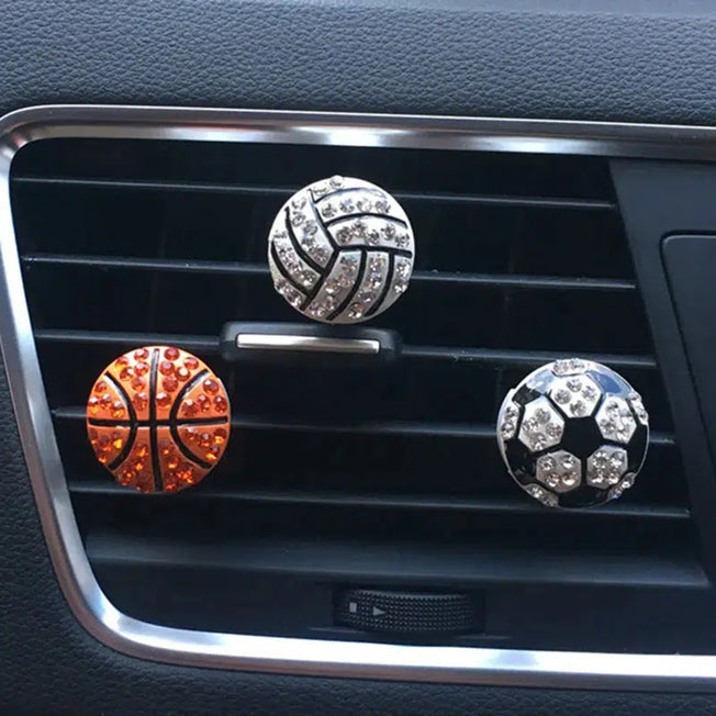 Add a touch of sporty style to your car interior with the Auto Interior Decor Diamond Soccer Basketball Vent Clip Car Aroma Diffuser