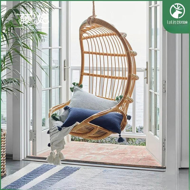 Vacation Vibe: Real Rattan Hanging Chair - Perfect for Balcony, Bedroom, or Living Room - Experience the Relaxation of a Rocking Chair in a Bird Cage Swing Basket