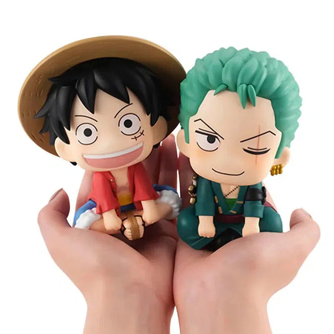 Explore the 7cm Anime Figures of Monkey D. Luffy and Roronoa Zoro from One Piece. These adorable PVC models make perfect gifts and stylish car decorations