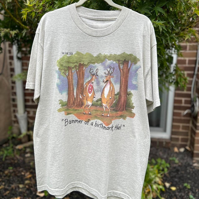 Far Side Nostalgia: Embrace timeless humor with our vintage "Bummer Of A Birthmark, Hal" tee. Gary Larson's iconic comic in XL for a classic touch.